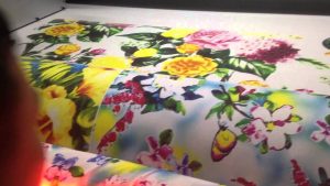 UV printing process on fabric and leather showcasing vibrant, high-quality designs for commercial use.